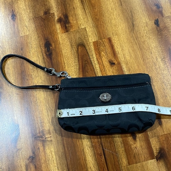 Coach Signature Turnlock Wristlet - Picture 9 of 10